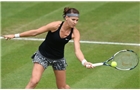 BIRMINGHAM, ENGLAND - JUNE 11:  Lucie Safarova of Czech Republic returns a shot against Barbora Zahlavova Strycova of Czech Republic on day three of the Aegon Classic at Edgbaston Priory Club on June 11, 2014 in Birmingham, England.  (Photo by Tom Dulat/Getty Images)